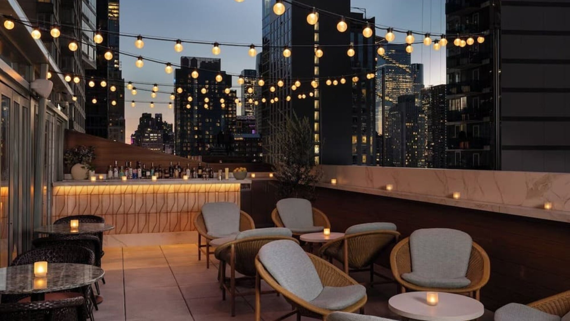Terrace lounge area at Kimpton Theta New York - Times Square.