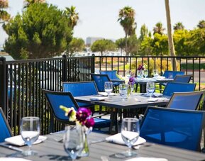 Terrace seating area at DoubleTree By Hilton San Francisco Airport North Bayfront.