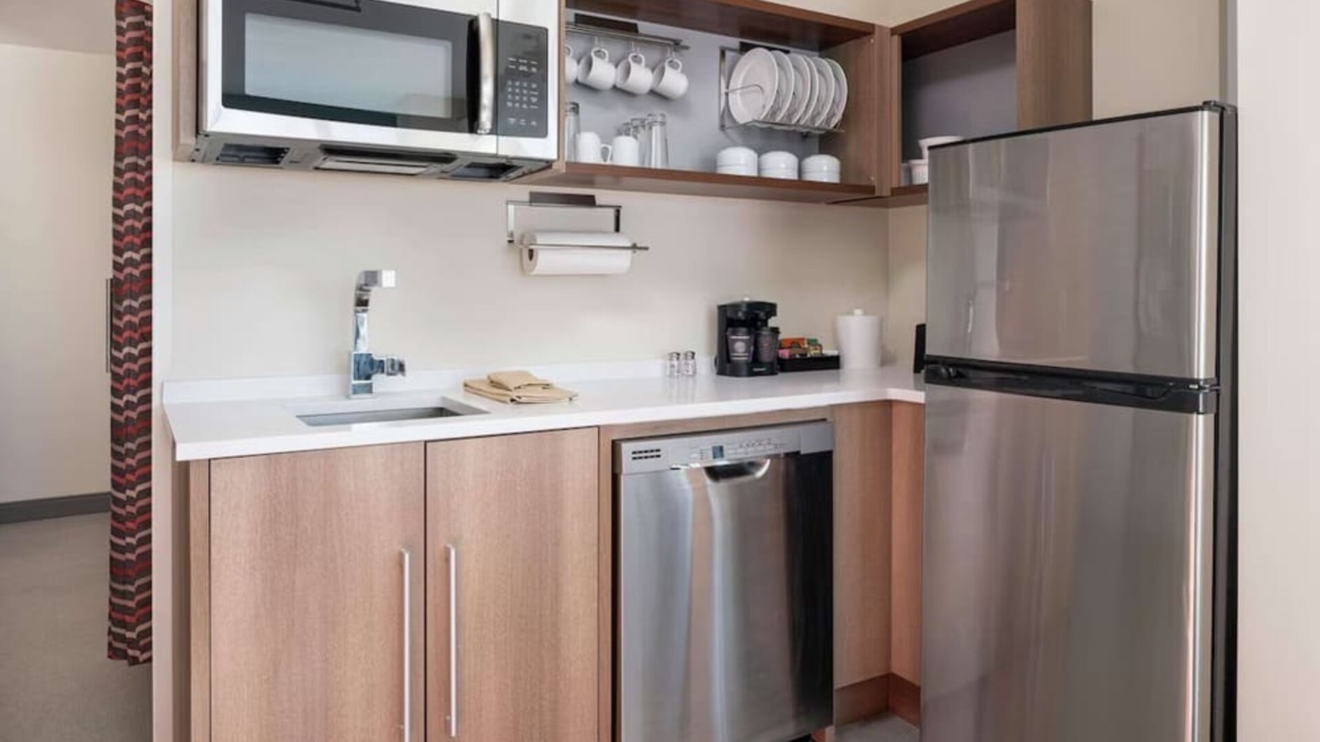 Day use suite's in-room kitchen at 	Home2 Suites By Hilton Denver Downtown Convention Center.