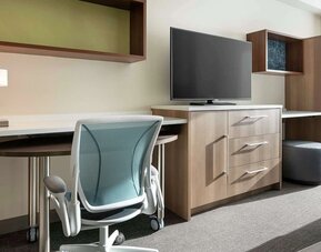 Day use room's workspace at 	Home2 Suites By Hilton Denver Downtown Convention Center.