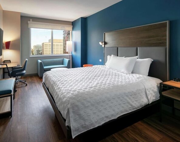 King bed at Tru By Hilton Denver Downtown Convention Center.