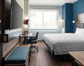 Day use room with work desk at Tru By Hilton Denver Downtown Convention Center.