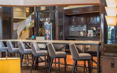 Lobby workspace and coffee shop at Hilton Newark Airport.
