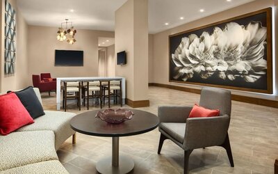 Lounge area and coworking space at Crowne Plaza Dallas Market Ctr - Love Field.