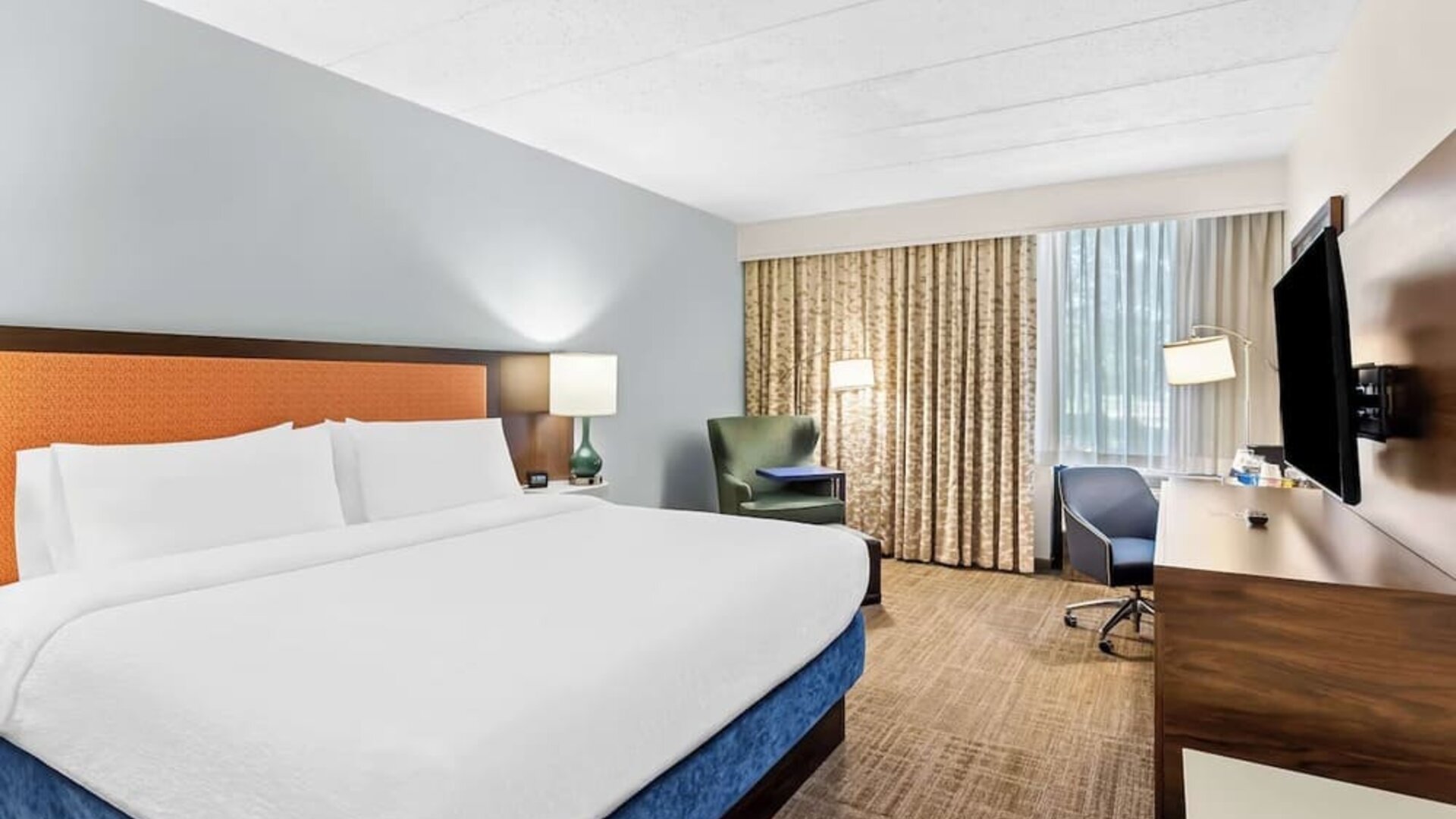 Bright and spacious day use room with work desk at Hampton Inn Chicago/Naperville.