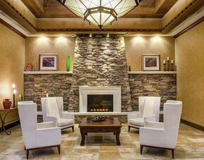 Elegant lobby area with fireplace perfect as workplace at the DoubleTree by Hilton Seattle Airport.