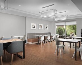 Dining area perfect for coworking at TownePlace Suites Franklin Cool Springs.