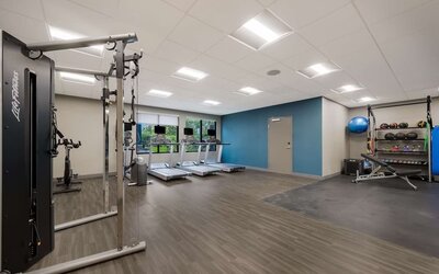 Spacious fitness center at Hampton Inn Detroit Southfield.
