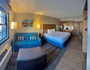 Day use room with workspace, in-room kitchen and living area at MainStay Suites Oak Brook Terrace - Chicago.