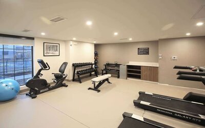 Well equipped fitness center at Sleep Inn Oakbrook Terrace.