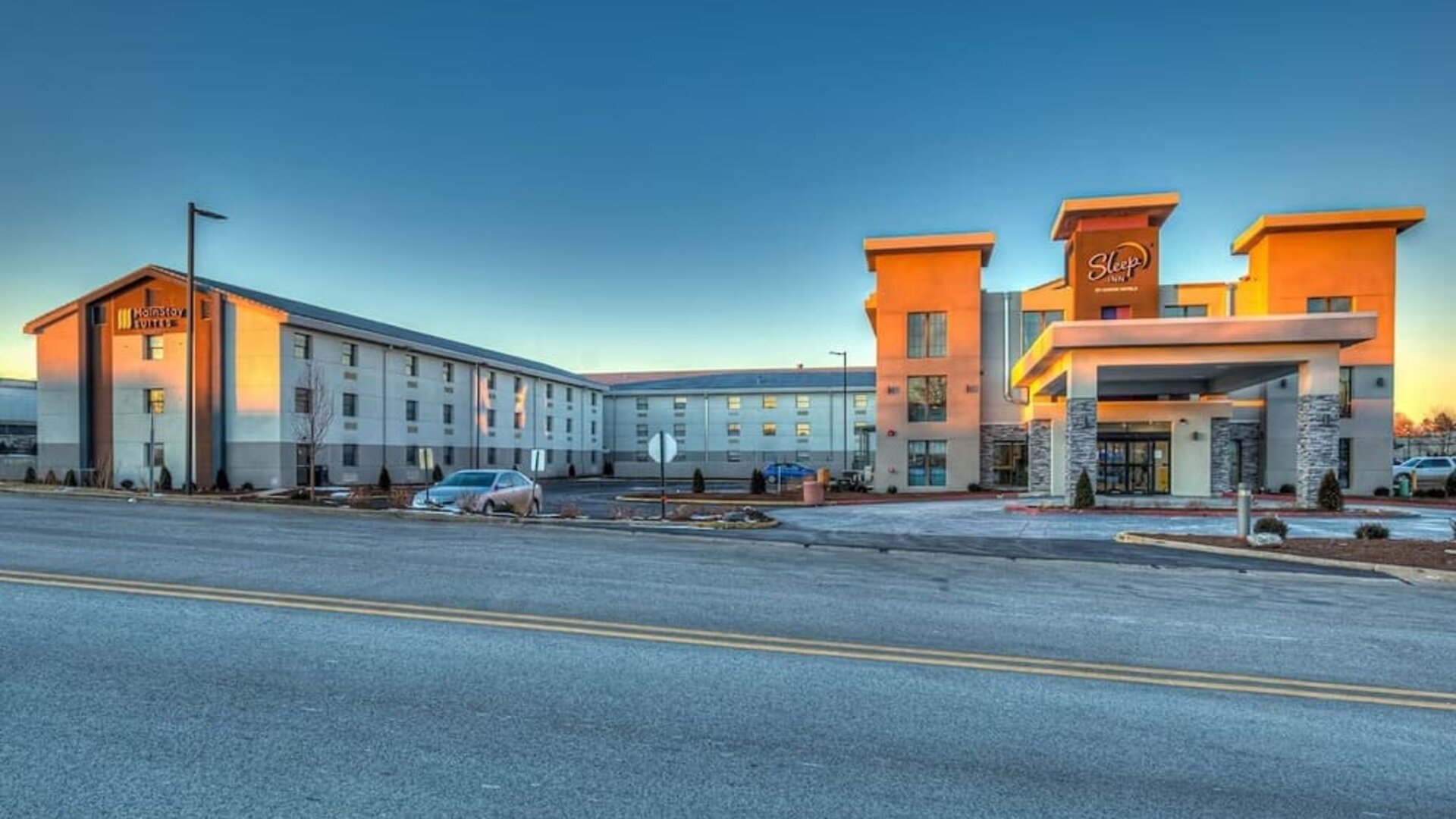 Exterior and parking area at Sleep Inn Oakbrook Terrace.