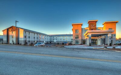 Exterior and parking area at Sleep Inn Oakbrook Terrace.