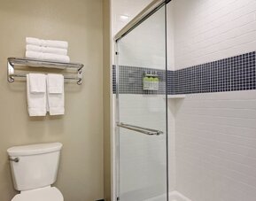 Private gueest bathroom with shower and free toiletries at Staybridge Suites Washington D.C.- Greenbelt.