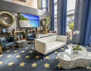 Lobby lounge area and workspace at Catalina Hotel & Beach Club.