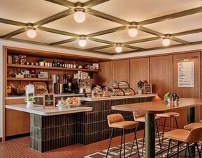 Hotel's coffee shop perfect for coworking at Romer Hell's Kitchen.