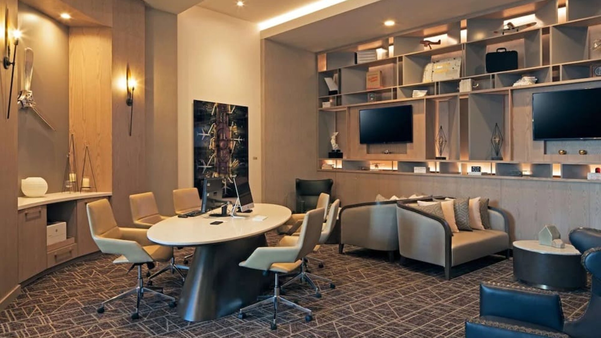 Business center with computers, printer and ergonomic seating at H Hotel Los Angeles, Curio Collection By Hilton.
