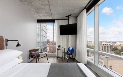 Day use room with a view of the city at Moxy Boston Downtown.