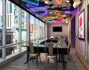 Meeting room with natural light at Moxy Boston Downtown.