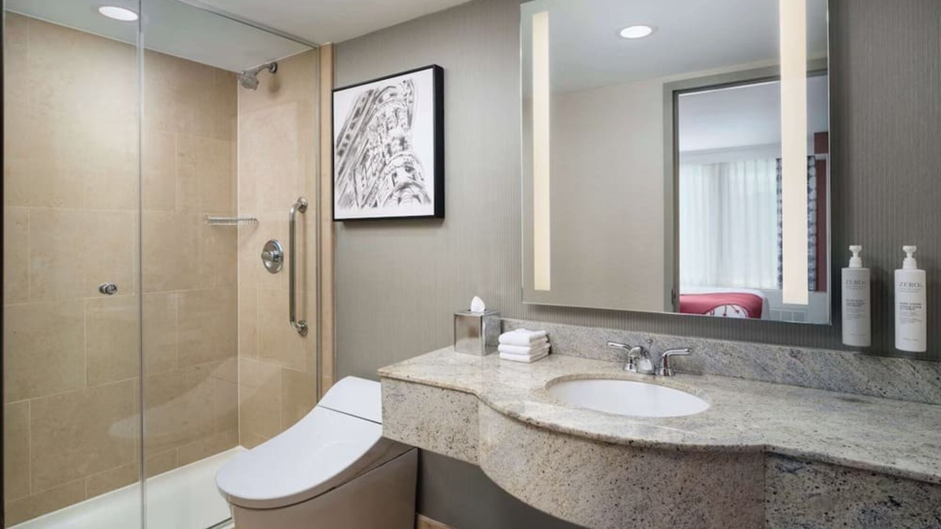 Private guest bathroom with shower at Hilton Garden Inn New York/West 35th Street.
