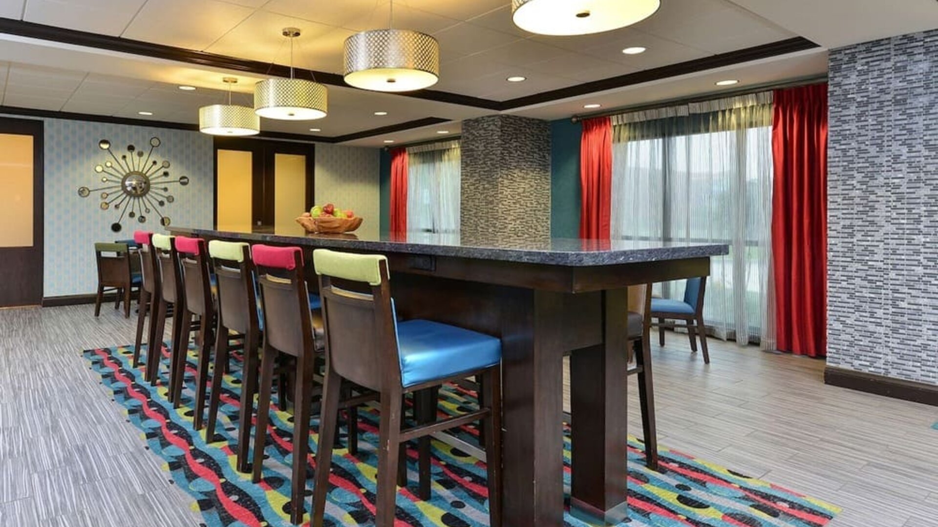Dining area and workspace at Hampton Inn Iowa City/University Area.