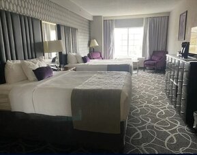 Day use twin room with lounge seating at Park Manor Hotel. 