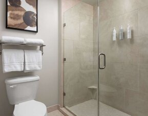 Private guest bathroom with shower at Homewood Suites By Hilton Shreveport / Bossier City, LA.
