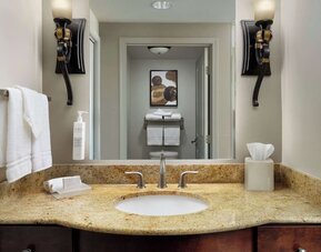 Private guest bathroom with free toiletries at Homewood Suites By Hilton Shreveport / Bossier City, LA.