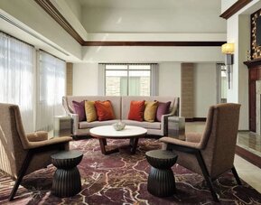Lobby lounge area with comfortable seating, perfect for coworking at Homewood Suites By Hilton Shreveport / Bossier City, LA.