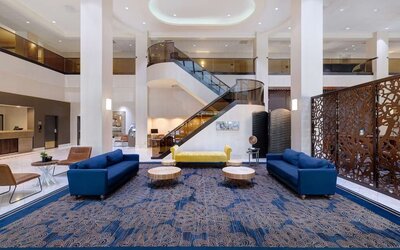 Lounge and coworking space at Embassy Suites By Hilton Santa Clara Silicon Valley.