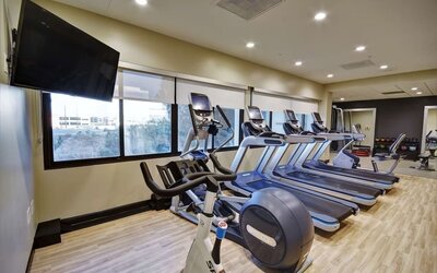 Well equipped fitness center at Embassy Suites By Hilton Santa Clara Silicon Valley.