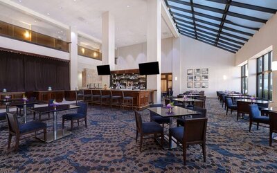 Spacious hotel bar perfect for coworking at Embassy Suites By Hilton Santa Clara Silicon Valley.