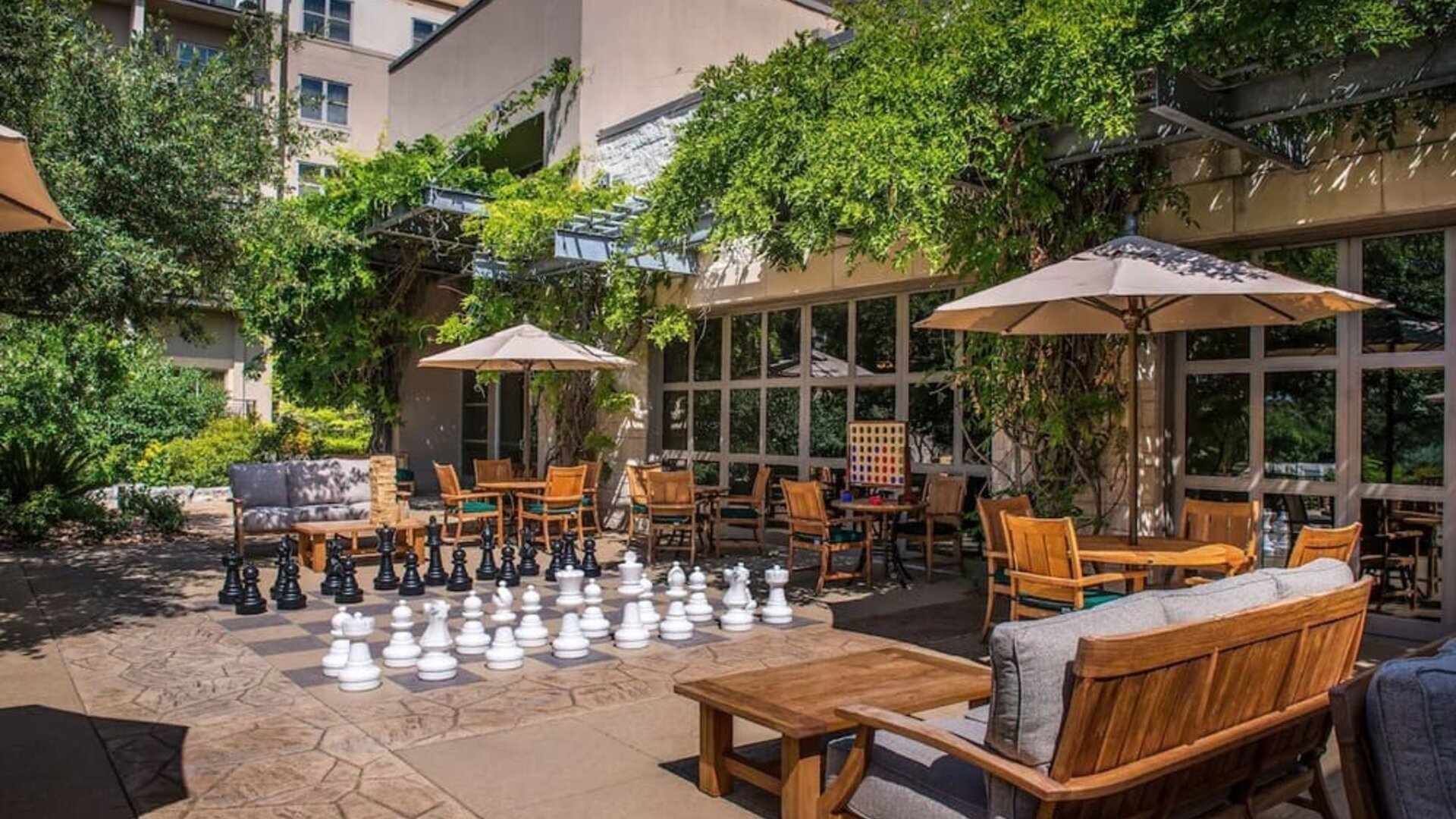 Outdoor garden and coworking space at Hilton San Antonio Hill Country.