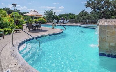 Relaxing pool area at Hilton San Antonio Hill Country.