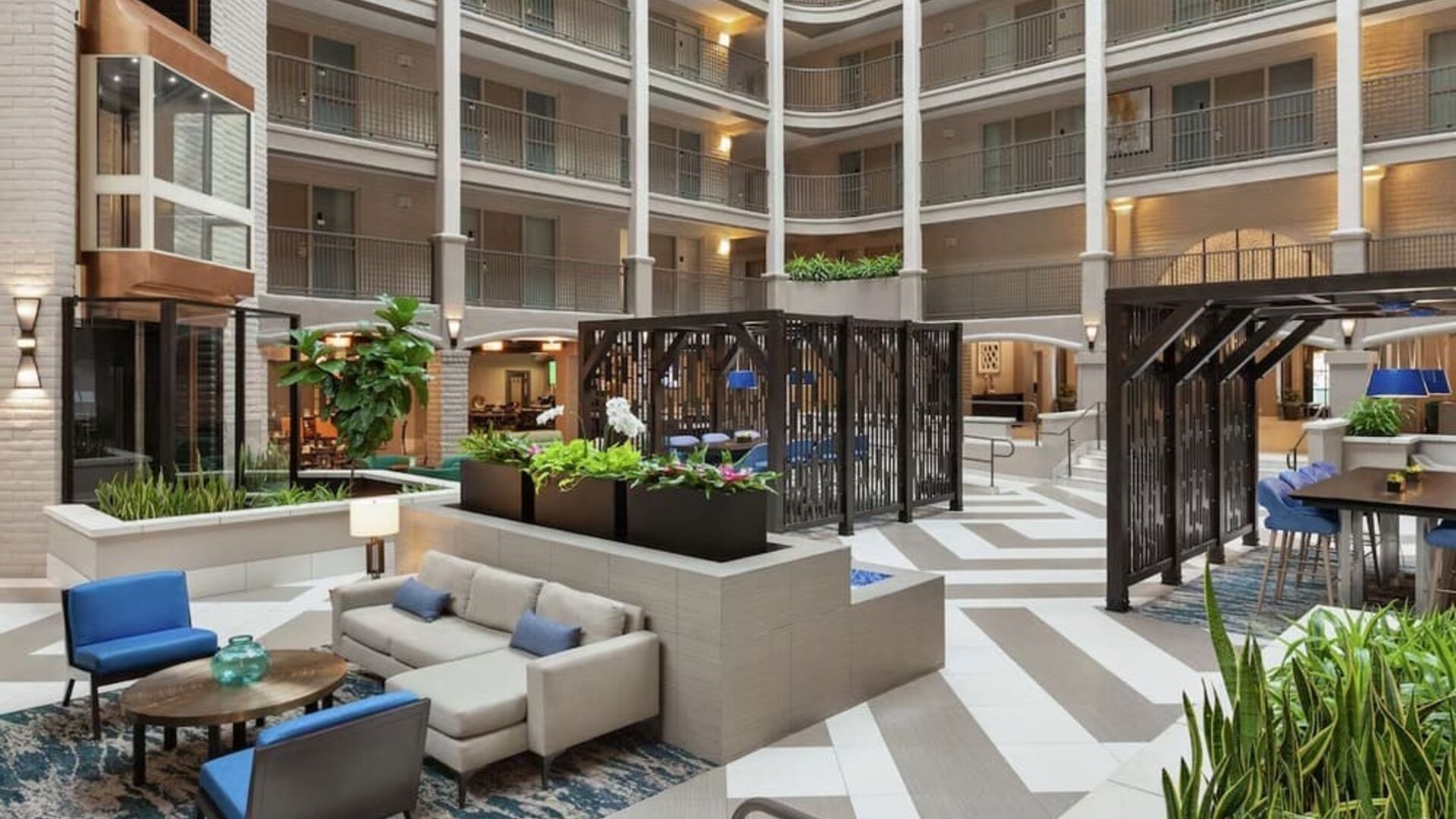 Lobby lounge and workspace at Embassy Suites By Hilton Arcadia Pasadena Area.