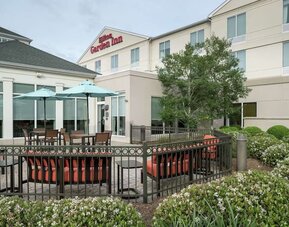 Exterior lounge seating, perfect for coworking at Hilton Garden Inn Dothan.