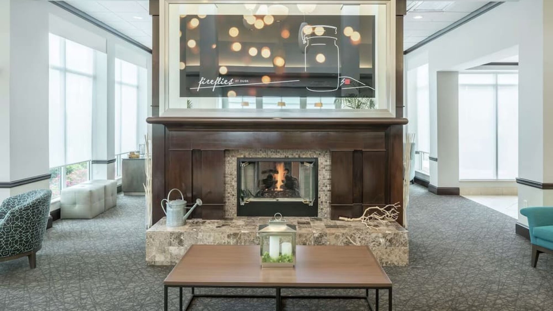 Lobby lounge area with fireplace at Hilton Garden Inn Dothan.