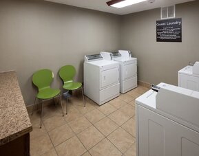 Launry room at Homewood Suites By Hilton Denton.