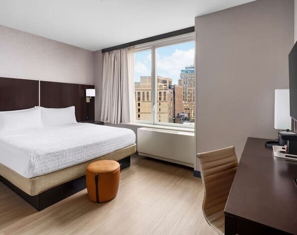 Bright and spacious day use room with work desk at Hampton Inn Manhattan/Times Square Central.