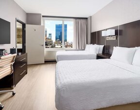 Day use twin room with work desk at Hampton Inn Manhattan/Times Square Central.