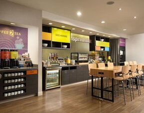 Dining area perfect for coworking at Home2 Suites By Hilton Charleston Airport/Convention Center.