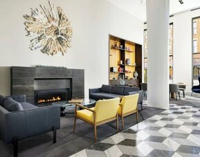 Lobby and coworking space with fire place at Le Méridien Columbus, The Joseph.