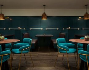 Dining area with comfortable seating, perfect for co-working at Stanford Court San Francisco.
