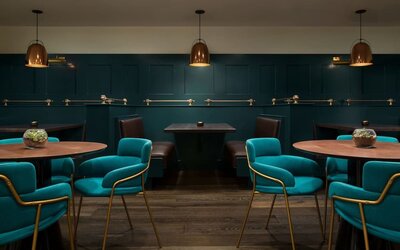 Dining area with comfortable seating, perfect for co-working at Stanford Court San Francisco.