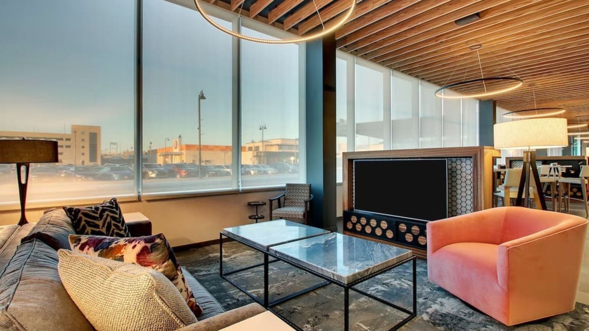 Lobby lounge area at The Rose Hotel Chicago O’Hare, Tapestry Collection By Hilton.