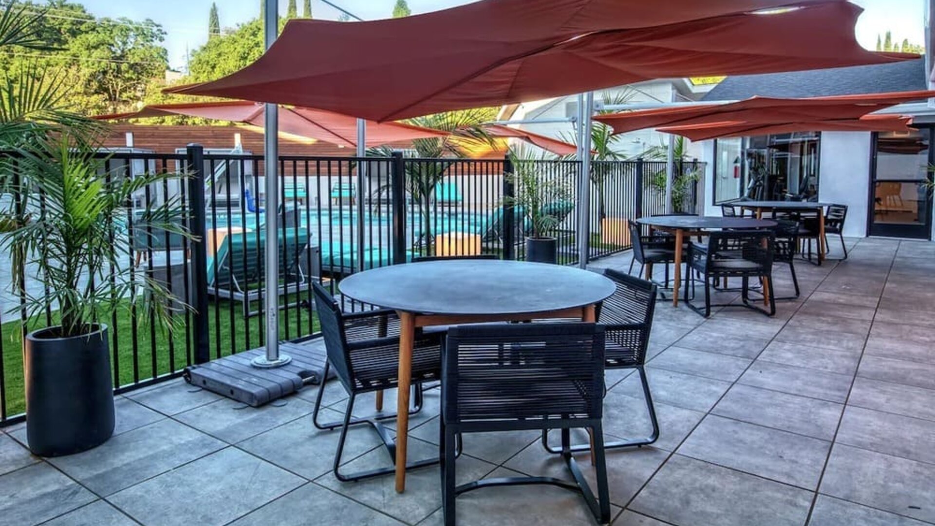 Hotel terrace with lounge seating at Hampton Inn Vallejo.