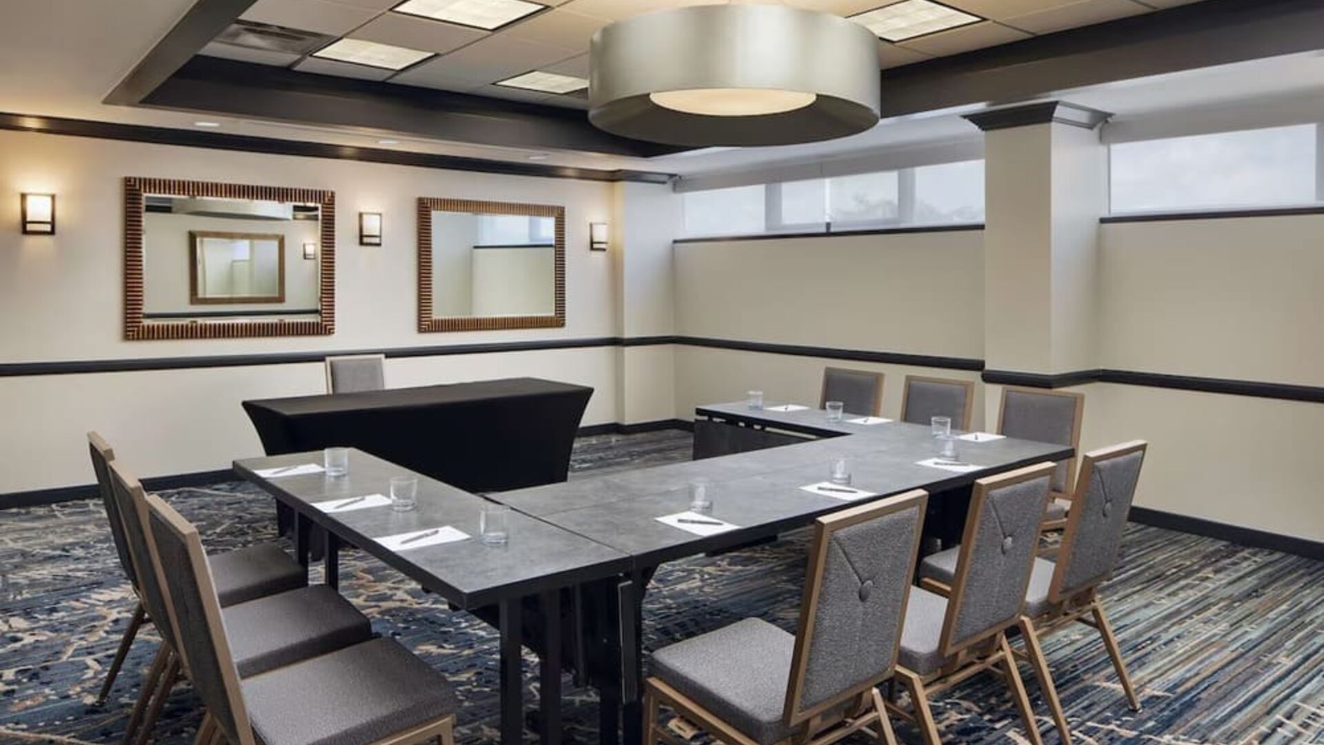 Professional meeting room at Embassy Suites By Hilton West Palm Beach Central.