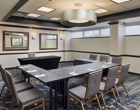 Professional meeting room at Embassy Suites By Hilton West Palm Beach Central.