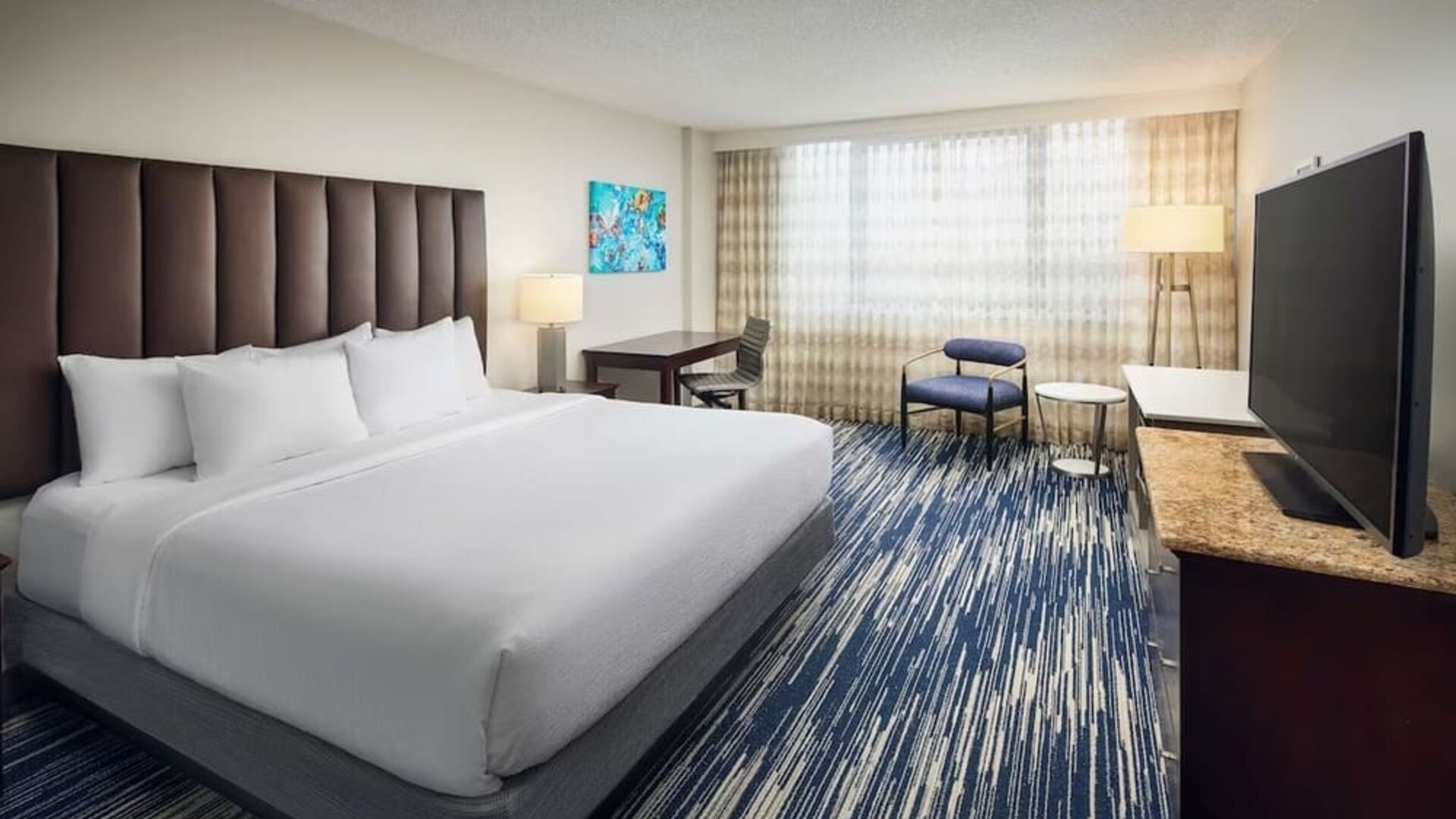Day use room with work desk at Embassy Suites By Hilton West Palm Beach Central.