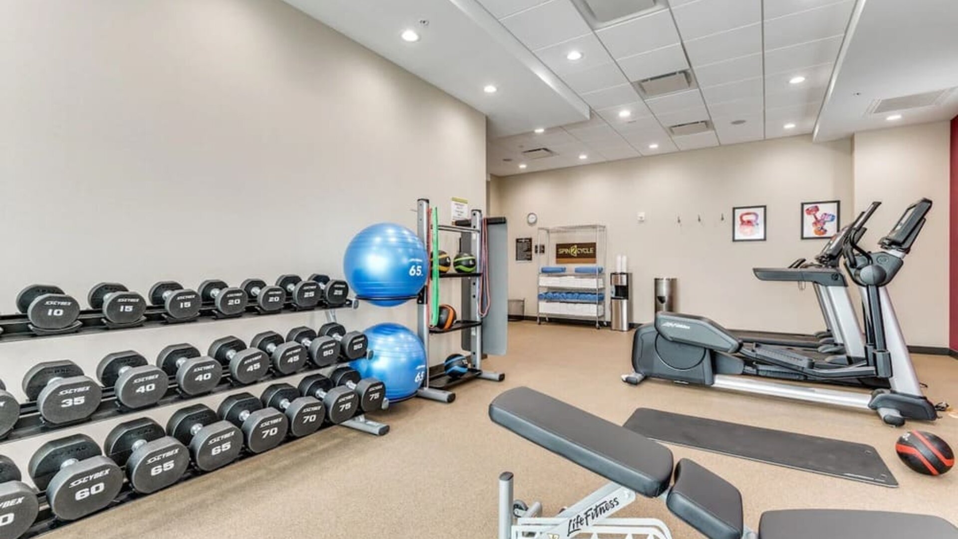 Well equipped fitness center at Home2 Suites By Hilton Dallas Medical District Lovefield.