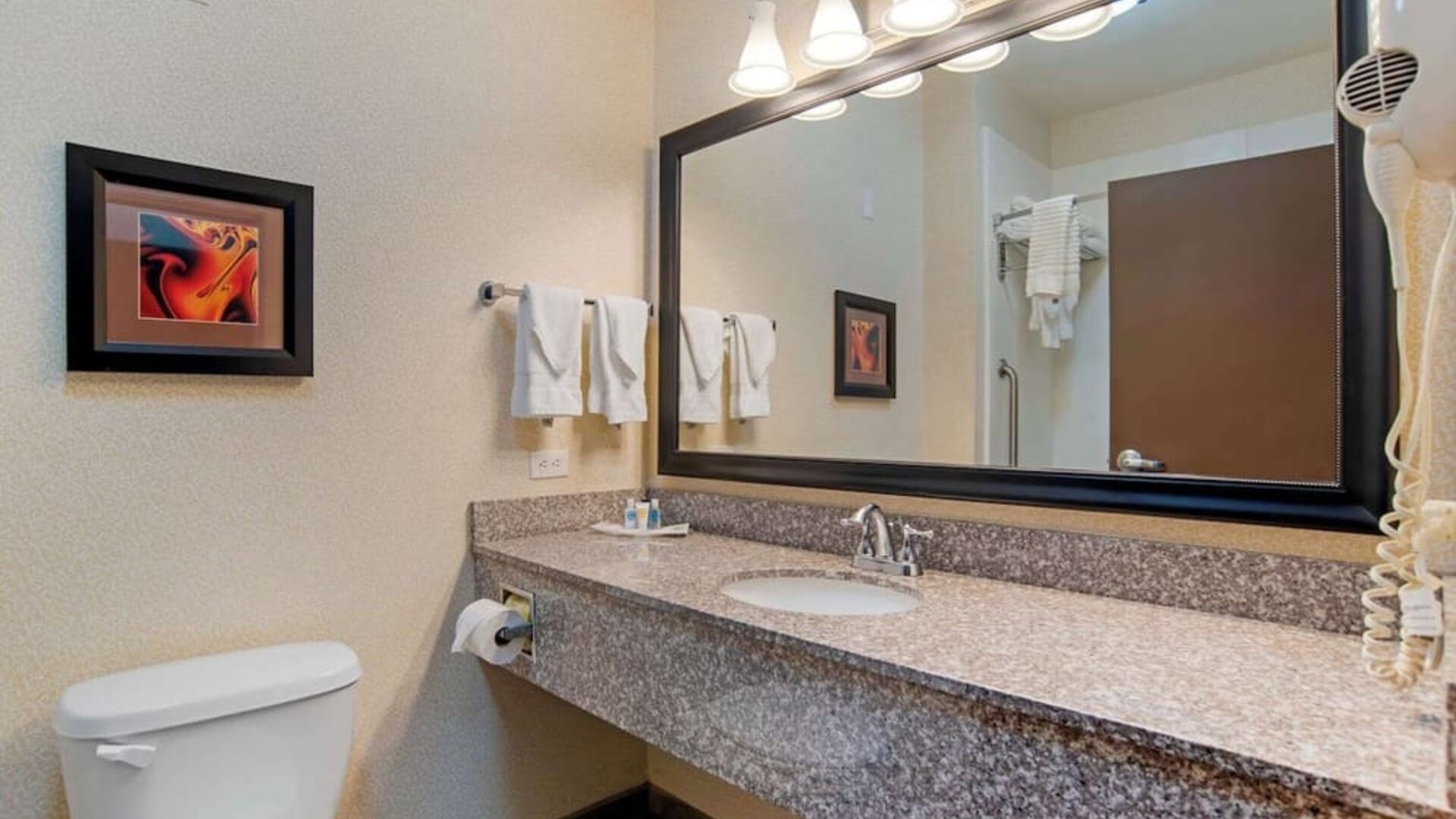 Private guest bathroom with free toiletries at Comfort Suites Alexandria, LA.